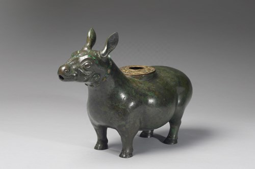 Zun wine vessel in the shape of animal with malachite and turqoise inlay Mid Warring States Period